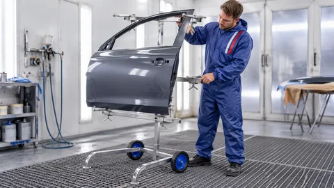 Werkstattszene: Autotüren lackieren: Aufnahme und Arbeitsplatz gemeinsam planen